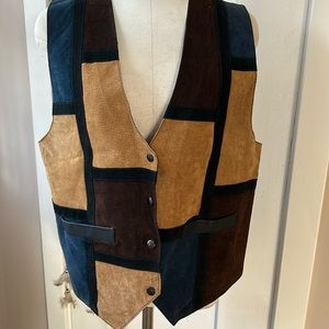 Leather patchwork vest. Very cool 70’s vibe!